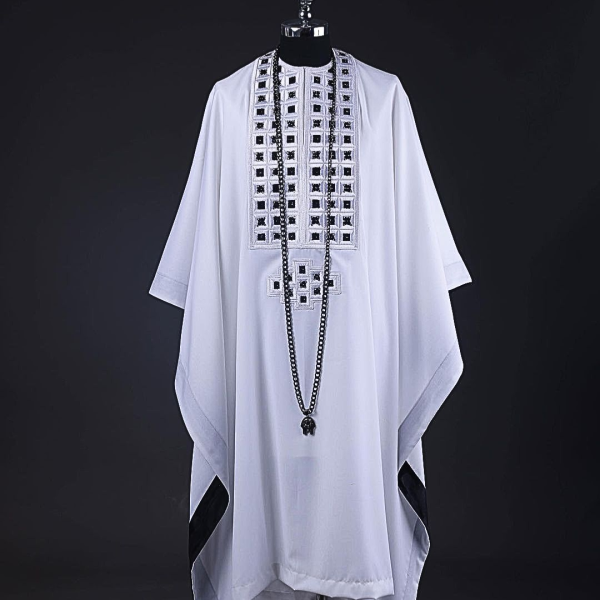 A White, Connected Square Embroidery Design With Matching Black And Silver Swarovski Stone Details Agbada