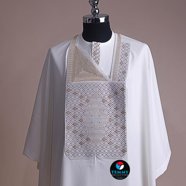 An Ivory white, chinoiserie chic pagoda with layers metallic wire embroidery details agbada