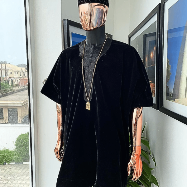 A charcoal black “daftan” from soaked Italian velvet fabric with a cross section matching marked hat