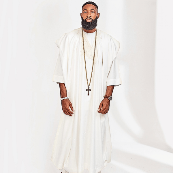 A Milk White embroidery detailing African Agbada