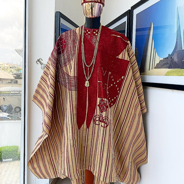 A Stripe champagne gold, cream, burgundy, aso oke regal agbada
