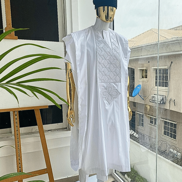 A voil jacquard cocaine white with an aligned square pattern design Agbada
