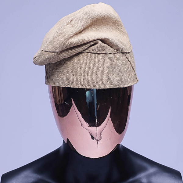 A Tortilla brown Yoruba traditional hat/Fila.