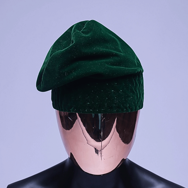 A sacramento green velvet Yoruba traditional hat/Fila.