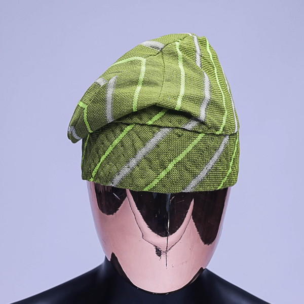 A lemon stripped hand knitted Yoruba traditional hat/Fila.