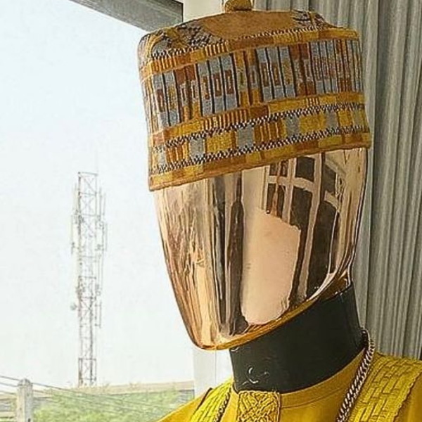 A Mustard Yellow mix Hausa Fulani hat.